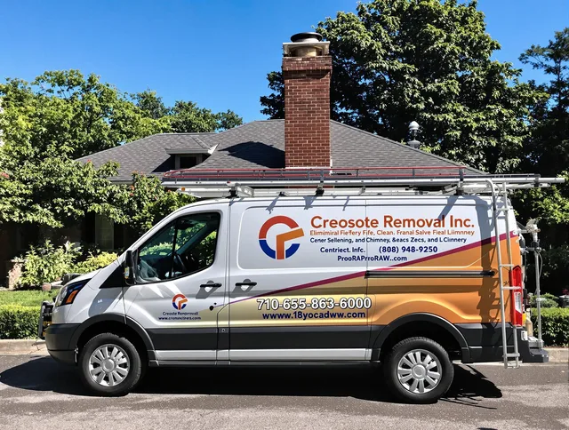 Green Chimney Sweep technician removing creosote safely in Green, OH