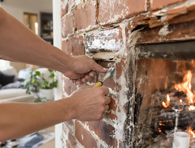 Routine fireplace repair by Green Chimney Sweep in Green, OH